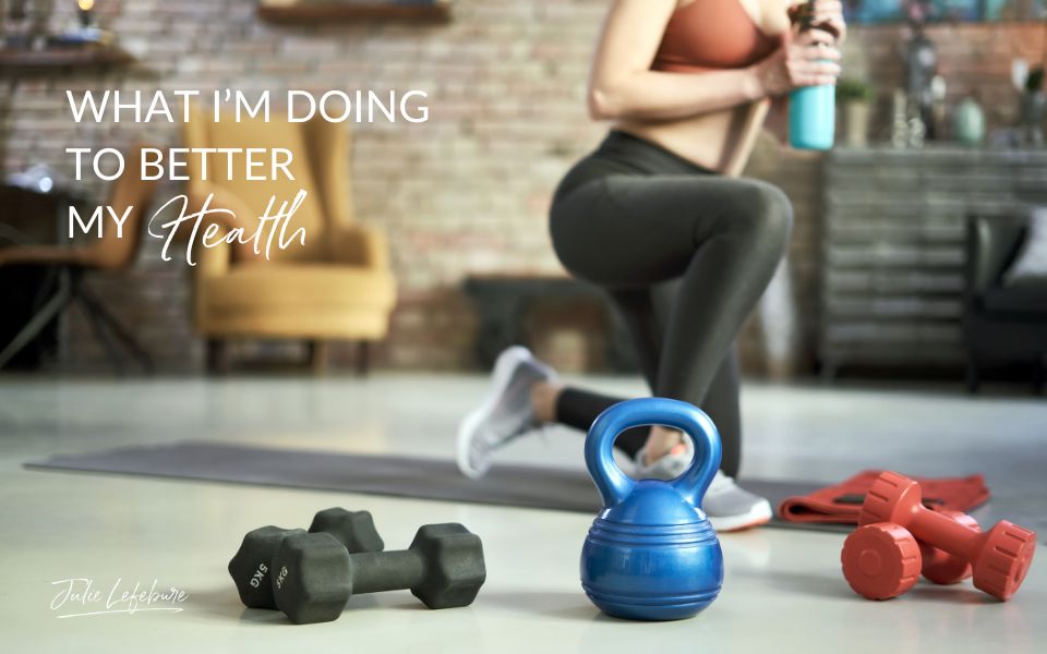 What I'm Doing to Better My Health | woman in workout clothes kneeling on one knee with waterbottle in hand and weights in the foreground